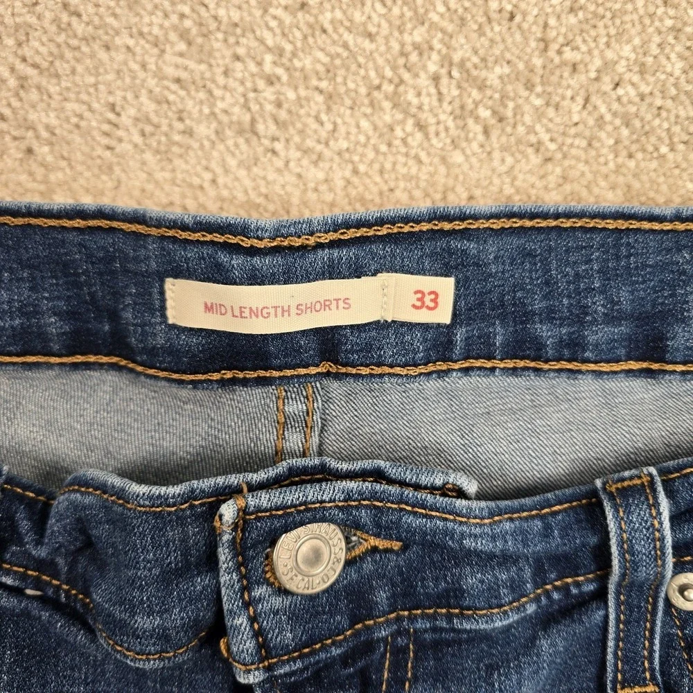 Levi's Mid Length Women's‎ Jean Shorts Size 33 Blue Cuffed Distressed